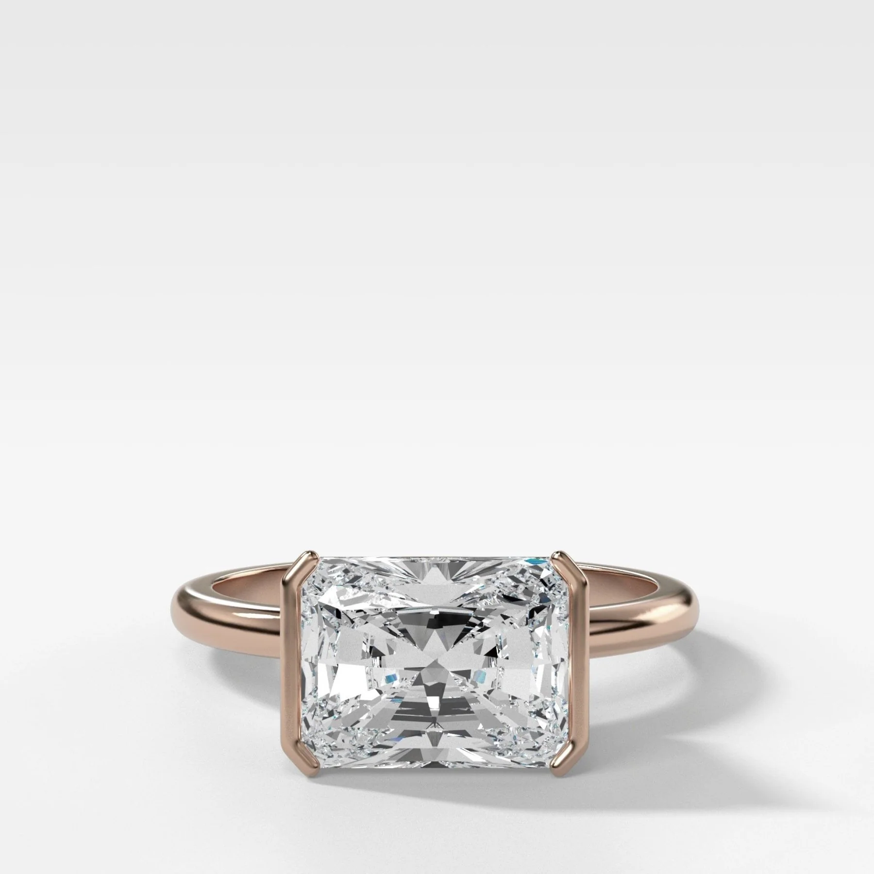 East West Half Bezel Solitaire Engagement Ring With Elongated Radiant Cut Diamond - Image 5